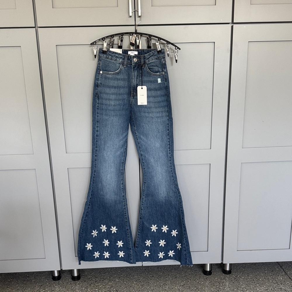 Forever 21 Blue Flare Jeans with White Floral Design